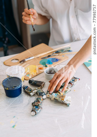 artist workplace painting art hands with oil paint artist workplace painting art hands with oil paint 77998757