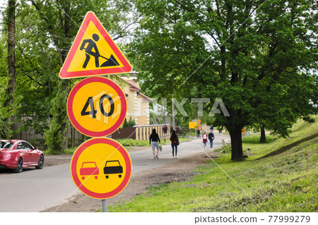 Road signs. Road works. Road warning signs. City streets. No overtaking. Speed limit. Road signs. Road works. Road warning signs. City streets. No overtaking. Speed limit. 77999279