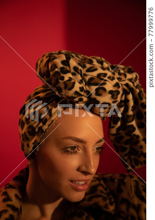 Studio portrait of glamorous woman with nude makeup 77999776