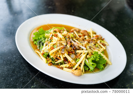 Thai spicy three eggs salad, popular thai seafood dish Thai spicy three eggs salad, popular thai seafood dish 78000011