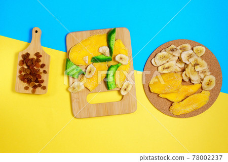 Mixture of dried fruits. Top view. Symbols of the Jewish holiday Tu Bishvat. 78002237