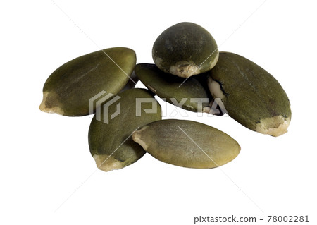 Peeled pumpkin seeds close-up macro isolated on white background. Peeled pumpkin seeds close-up macro isolated on white background. 78002281
