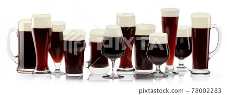 Set of fresh stout beer glasses with bubble froth isolated on white background. Set of fresh stout beer glasses with bubble froth isolated on white background. 78002283