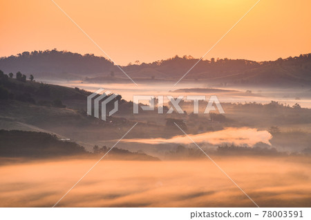 Misty landscape in morning from Wat Gong Niam viewpoint the famous viewpoint in Khao Kho hill in Phetchabun, Thailand Misty landscape in morning from Wat Gong Niam viewpoint the famous viewpoint in Khao Kho hill in Phetchabun, Thailand 78003591