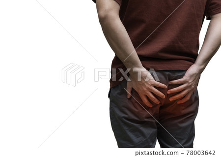 Close upmMan suffering from hemorrhoids, anal pain. painful spot highlighted in red. Close upmMan suffering from hemorrhoids, anal pain. painful spot highlighted in red. 78003642