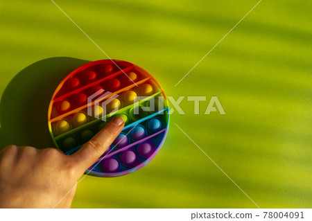 Trendy anti stress pop it toy flat lay with copy space. 78004091