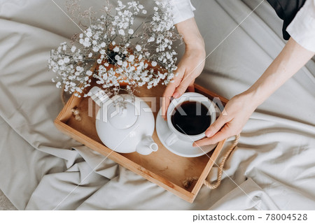 morning relaxation woman bed tray tea flowers morning relaxation woman bed tray tea flowers 78004528