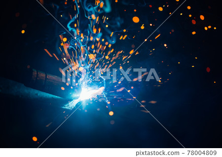artistic welding sparks light, industrial background 78004809