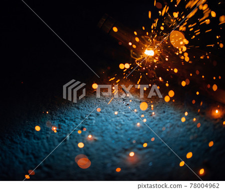 artistic welding sparks light, industrial background 78004962