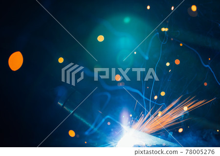 artistic welding sparks light, industrial background 78005276