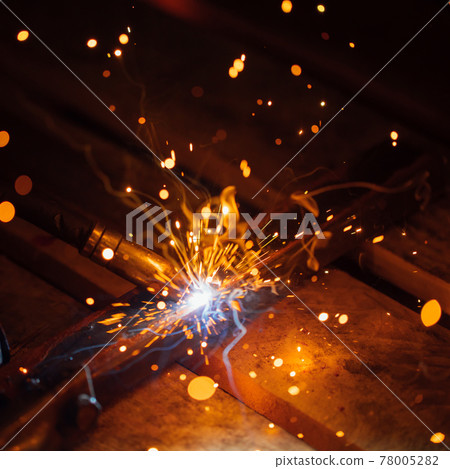 artistic welding sparks light, industrial background artistic welding sparks light, industrial background 78005282