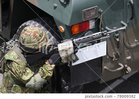 Self-Defense Forces personnel holding Type 89 rifle (looking down angle) 78009382