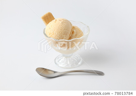 Vanilla ice cream with wafers white background 78013784