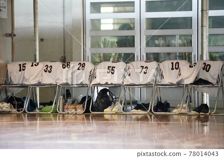 Bench with pre-basketball uniforms Bench with pre-basketball uniforms 78014043