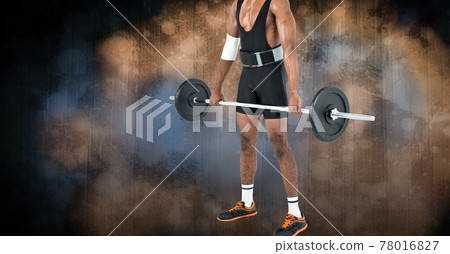 Composition of low section of strong african american man lifting barbell with copy space 78016827