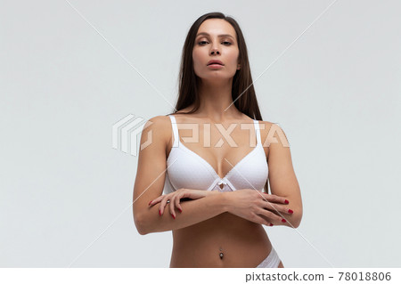 Slim woman in lingerie in studio Slim woman in lingerie in studio 78018806