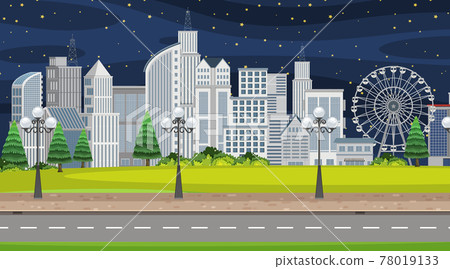 Town scene at night with many buildings along the road 78019133