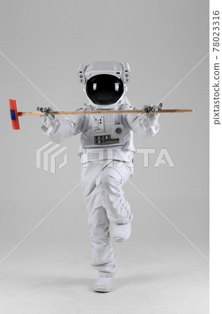 astronaut iwth cleaning brush, white background astronaut iwth cleaning brush, white background 78023316