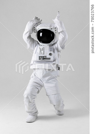 Astronaut holding a large object, white background Astronaut holding a large object, white background 78023766