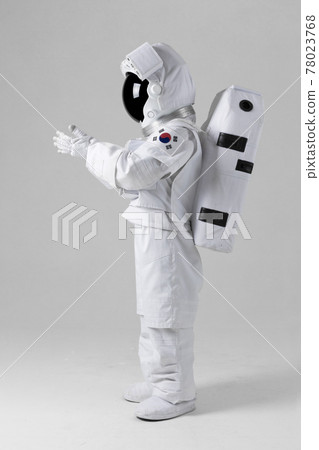 Astronaut holding with both hands, white background Astronaut holding with both hands, white background 78023768