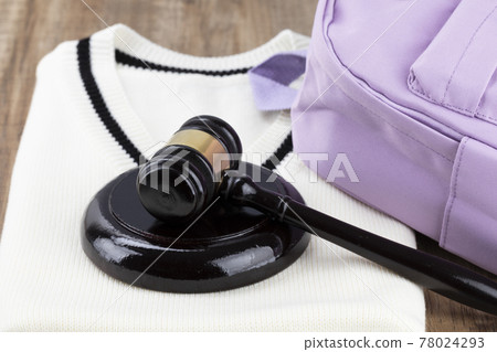 Crime and law- student criminal concept, book bag, school uniform and gavel 78024293