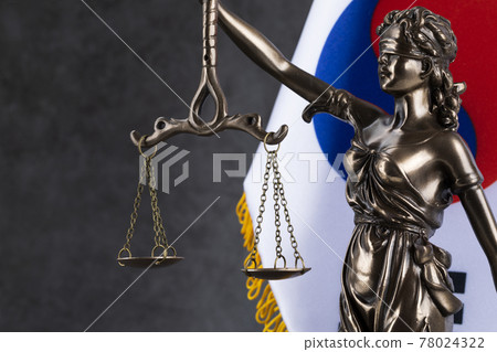 crime and law concept Republic of Korea flag and the Statue of Justice 78024322