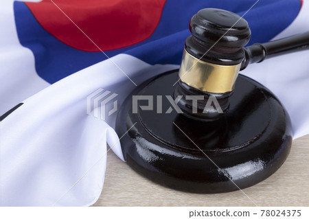 Republic of Korea flag, gavel and law book Republic of Korea flag, gavel and law book 78024375