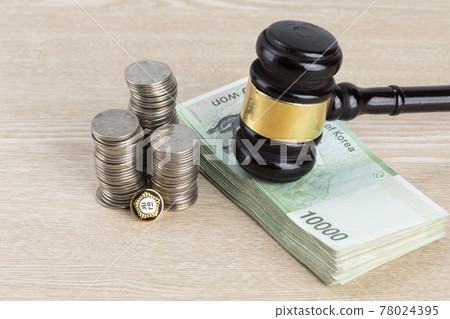 Crime and law - bribe concept, parlimamentary government badge, coins and money 78024395