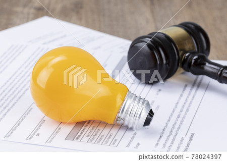 Crime and law - Documents and yellow bulbs and gavel Crime and law - Documents and yellow bulbs and gavel 78024397