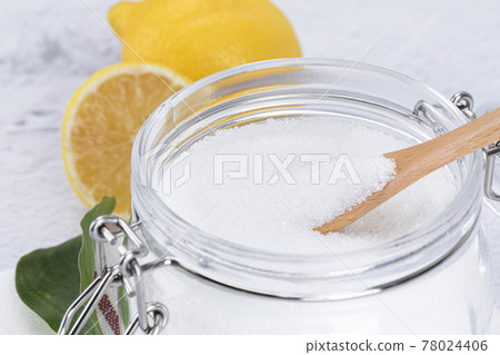 Zero waste cleaning - powdered citric acid, wood spoon and lemon Zero waste cleaning - powdered citric acid, wood spoon and lemon 78024406