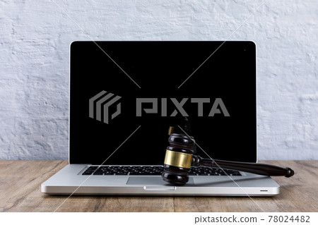 Crime and law - laptop and gavel Crime and law - laptop and gavel 78024482