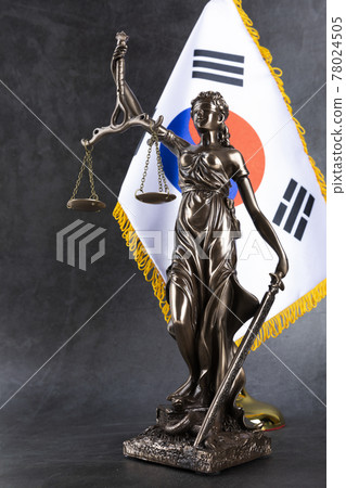 crime and law concept Republic of Korea flag and the Statue of Justice 78024505