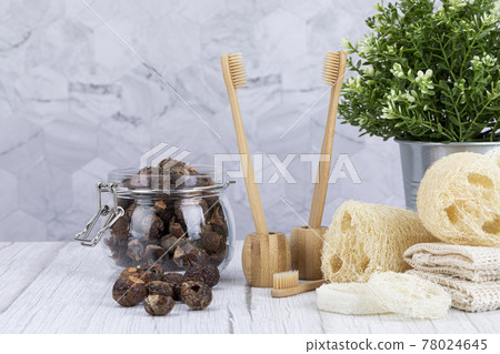 Zero waste concept- soap nut, bamboo brush and natural loofah 78024645