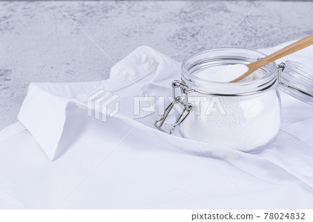 Zero waste concept, white shirt and a bottle of carbonated soda Zero waste concept, white shirt and a bottle of carbonated soda 78024832