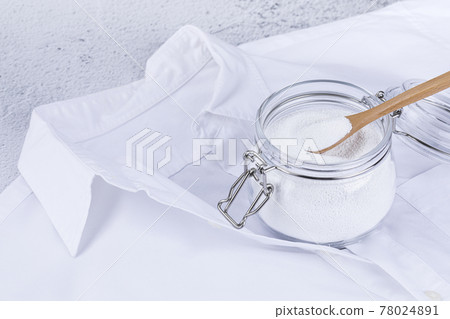 Zero waste concept, white shirt and a bottle of carbonated soda Zero waste concept, white shirt and a bottle of carbonated soda 78024891