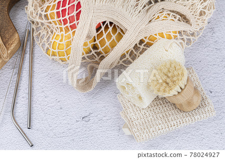 zero waste products, natural loofah, net bag with fruits, stainless straw 78024927