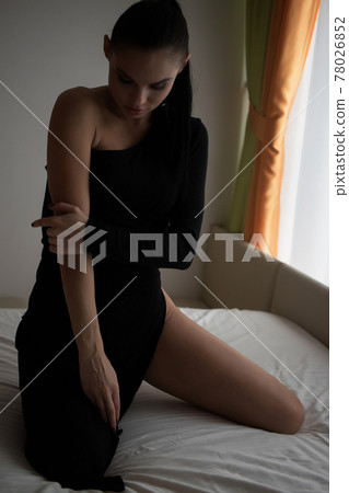 Brunette girl in a cat mask Brunette girl in a cat mask 78026852