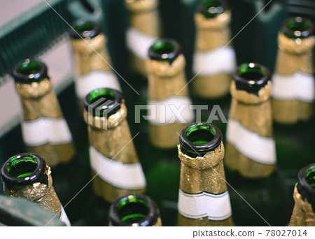 Empty beer bottles recycling 78027014