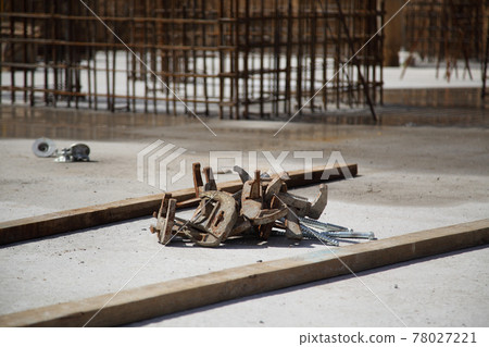 Construction of a residential building made of monolithic concrete. New residential area. Construction of a residential multi-storey building. Construction of a residential building made of monolithic concrete. New residential area. Construction of a residential multi-storey building. 78027221
