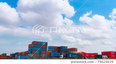 SAMUT PRAKAN, THAILAND-MAY 15, 2021 : Container at container yard for rent and truck. Container logistic. Freight transportation. Logistic industry. Container for truck transport. Cargo business. 78028039