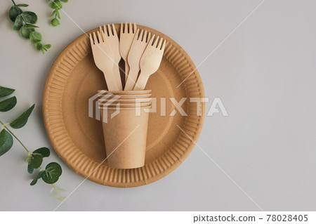 Eco friendly craft paper tableware with monstera leaf. Zero waste theme. 78028405