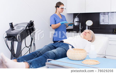 Female client waiting for cosmetological treatment 78029208