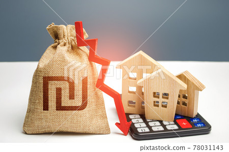 Israeli shekel money bag with down arrow and houses on calculator. Reducing maintaining cost, increasing energy efficiency. Falling real estate market, low prices and demand. Saving resources. 78031143