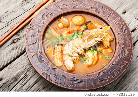 Tom yum soup with seafood and coconut milk Tom yum soup with seafood and coconut milk 78032159