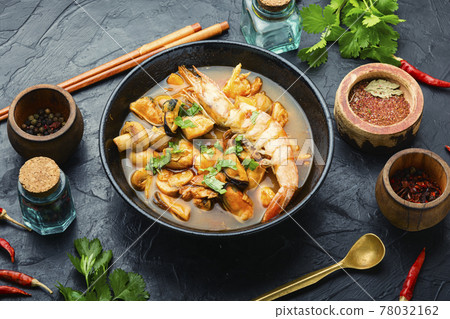 Tom yum soup with seafood and coconut milk Tom yum soup with seafood and coconut milk 78032162