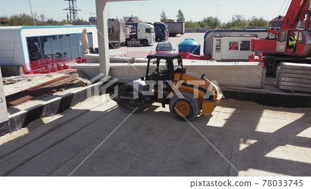 Lots of heavy construction equipment on construction, crane, truck, bulldozer, mini tractor and roller work on construction site. Special equipment in the press soil. Earthworks, Large construction 78033745