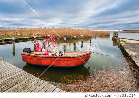 Fishing boat in the port of Ahrenshoop, Germany Fishing boat in the port of Ahrenshoop, Germany 78035214