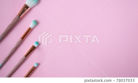 Set of make up brushes isolated on pink. Flat lay. Set of make up brushes isolated on pink. Flat lay. 78037033
