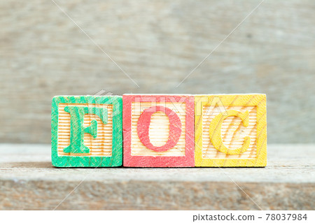 Color alphabet letter block in word FOC (Abbreviation of Free of charge) on wood background Color alphabet letter block in word FOC (Abbreviation of Free of charge) on wood background 78037984