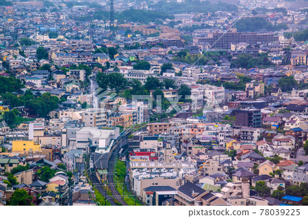 View of Japan's Yokohama cityscape, such as Kikuna Station and JR Yokohama Line trains 78039225